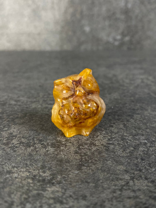 Golden healer uil carving